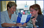 Receptionist with brochure